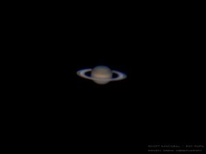 <p>This is a shot of Saturn I got at Frosty Drew Observatory using the Meade 16' SCT with my Canon S95 attached A-focally. In this shot the Cassini Division,equatorial bands in Saturn's atmosphere, and the shadow the planet casts on the rings are clearly visible.</p><p>Camera: Canon S95 (CHDK) with intervalometer, attached a-focally to the Frosty Drew Meade 16' SCT 4000mm fl, f/10<br />ISO: 80<br />Camera F-stop: f/4.9<br />Exposure: 3.2 seconds total exposure (16 images at 0.2 seconds each)<br />Photograph by: Scott MacNeill (http://exitpupil.org)</p>