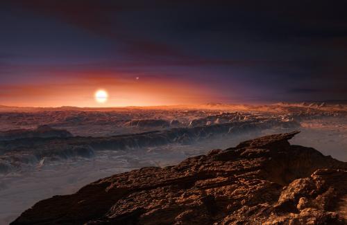 An artists impression of Proxima b around the dim red dwarf star, Proxima Centauri. Credit: ESO/M. Kornmesser