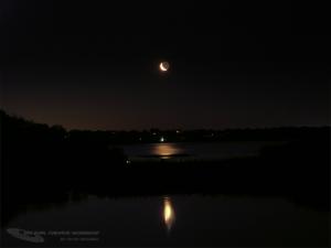 14% waning crescent Moon rising over the salt pond in Charlestown, RI. Photograph By: Scott MacNeill
