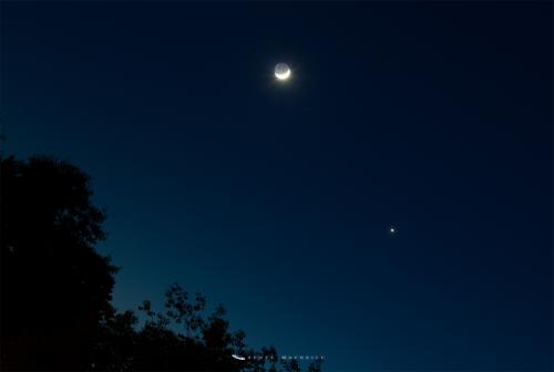 The crescent Moon and Venus in conjunction over Frosty Drew Observatory. Credit: Scott MacNeill