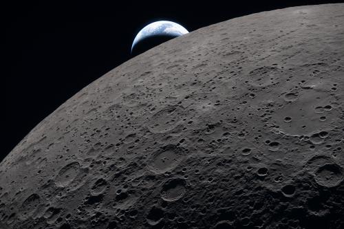 A photo of Earth around the side of the Moon from the Artemis II lunar flyby on April 6, 2026. Credit: NASA