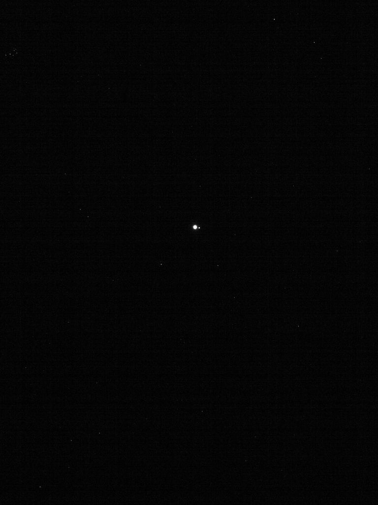 The Earth and Moon from 39.5 million Miles Distant