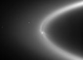 Enceladus and Saturn's E-ring. NASA/JPL/Space Science Institute