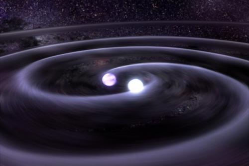 Gravitational waves created by fast orbiting neutron stars on a collision course. Credit: NASA