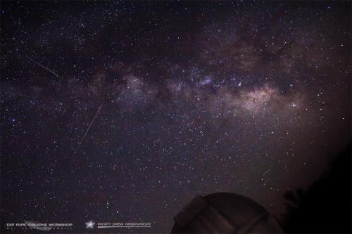 Eta Aquariid meteors silhouetted by the Milky Way over Frosty Drew Observatory.