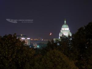 Crescent Moon setting over Providence, RI. Photograph by: Scott MacNeill