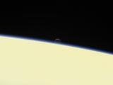 Enceladus Drops Behind Saturn as Cassini Plunges